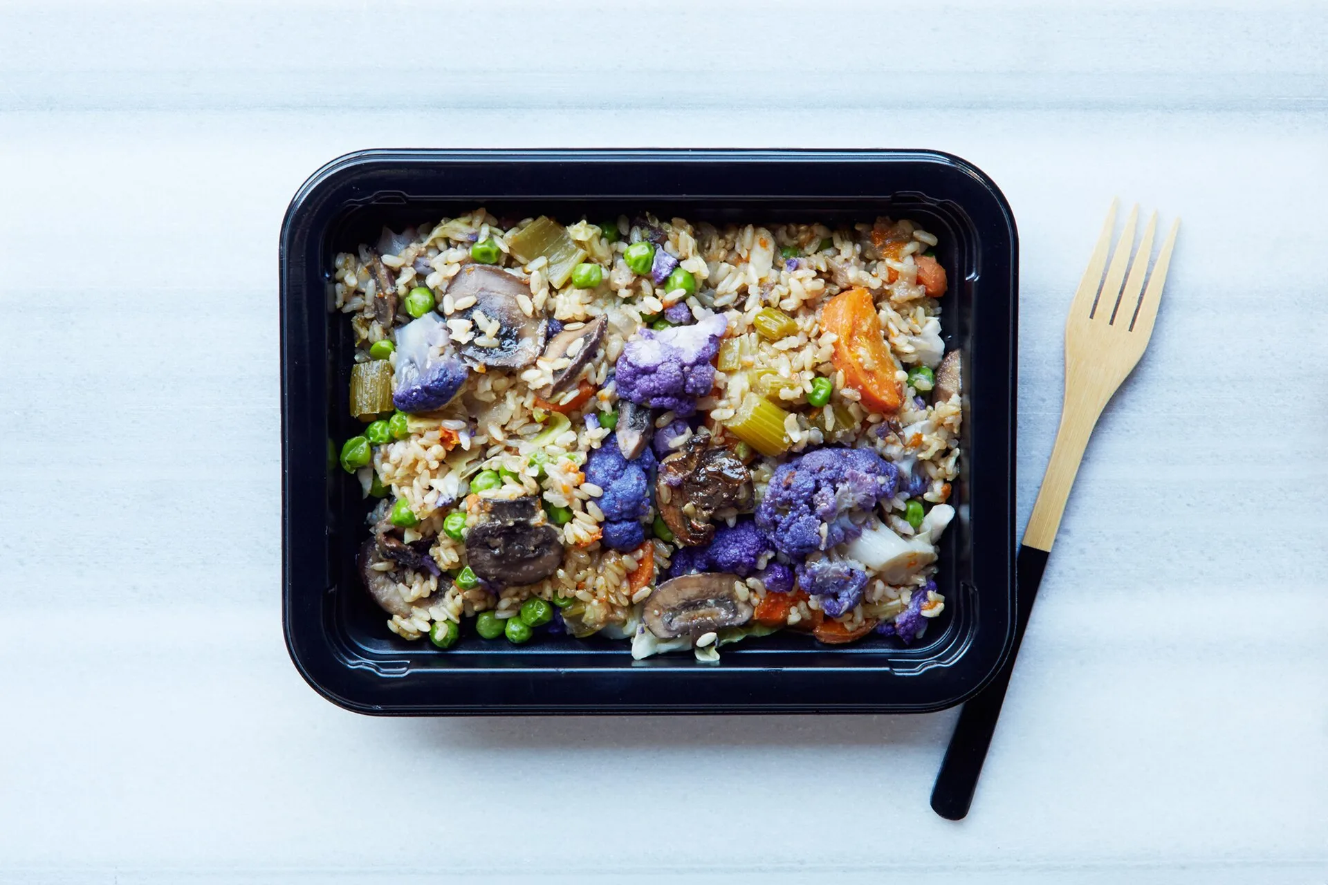 Ready made plant-based food in a meal prep container. Trying to get better at planning my meals ahead of time. Meal prep referral program: ask, partner, track