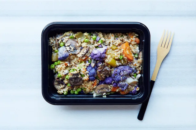 Ready made plant-based food in a meal prep container. Trying to get better at planning my meals ahead of time. Meal prep referral program: ask, partner, track