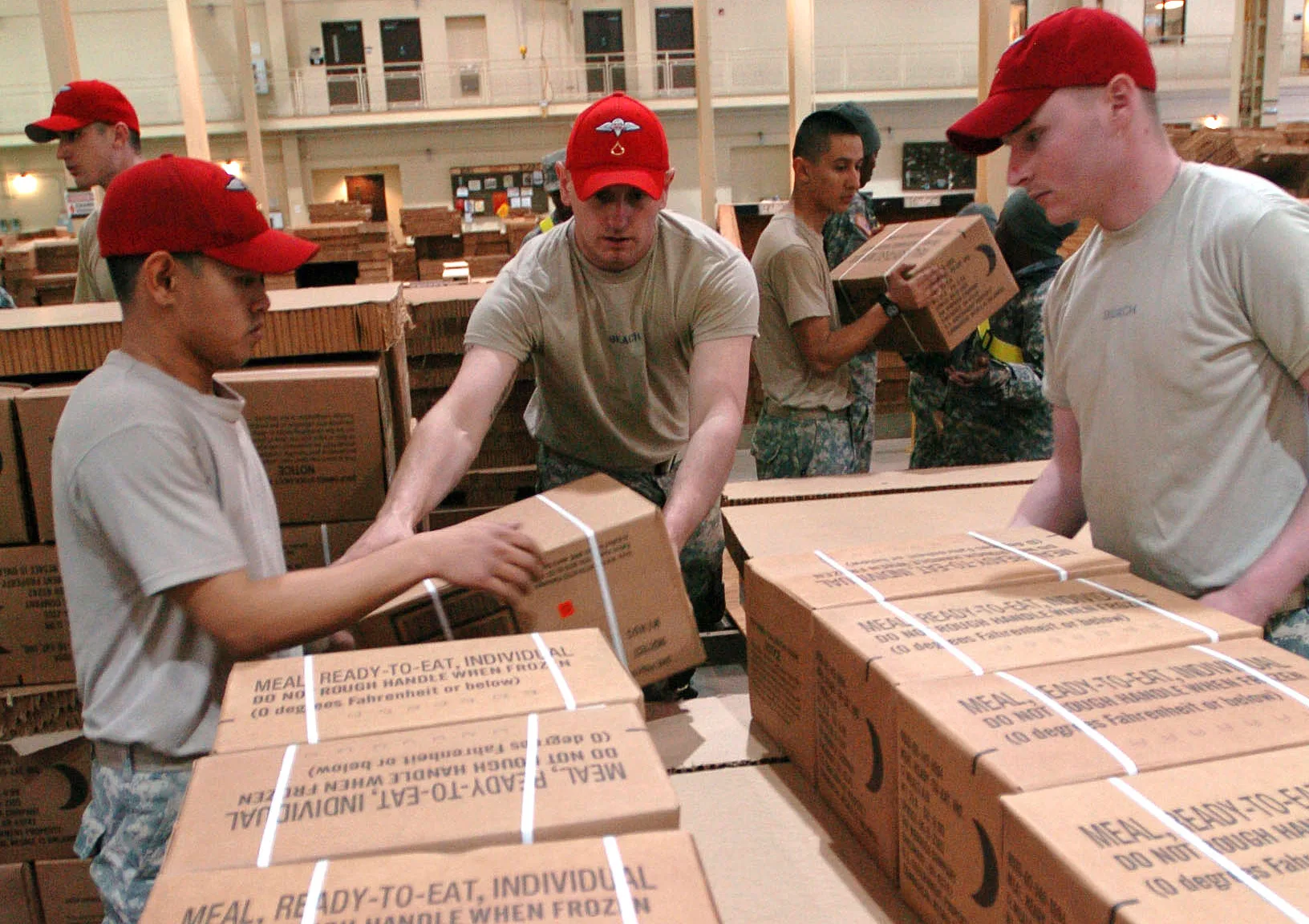 Parachute riggers from the Aerial Delivery Platoon, 11th Quartermaster Company, 189th Combat Sustainment Support Battalion, 82nd Sustainment Brigade, XVIII Airborne Corps, prepare container delivery system bundles of bottles of water and meals-ready-to-eat for delivery to the Haitian people in suppo. Starting a meal prep business with the market in view for 2027