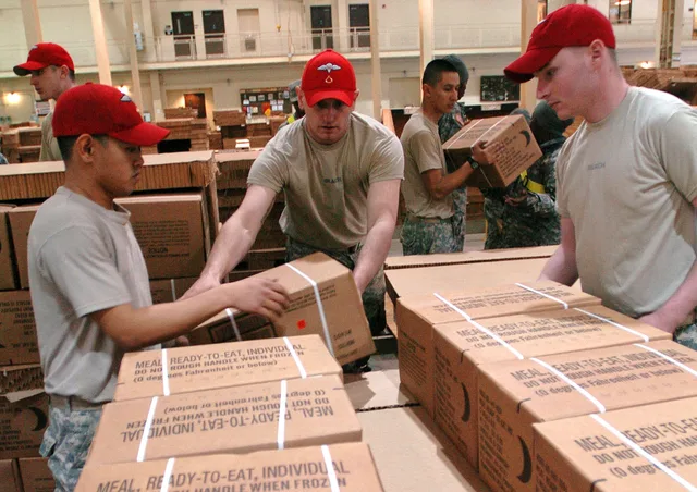 Parachute riggers from the Aerial Delivery Platoon, 11th Quartermaster Company, 189th Combat Sustainment Support Battalion, 82nd Sustainment Brigade, XVIII Airborne Corps, prepare container delivery system bundles of bottles of water and meals-ready-to-eat for delivery to the Haitian people in suppo. Starting a meal prep business with the market in view for 2027
